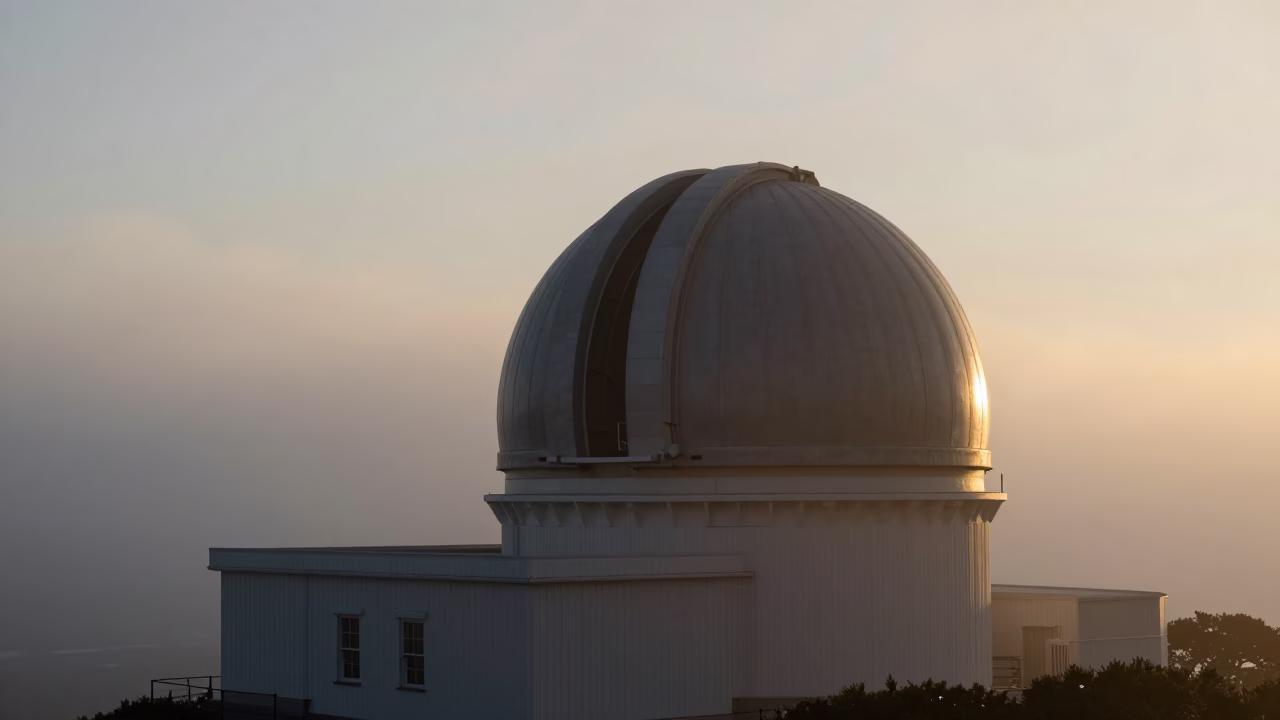 Cape Town Observatory Dome Silhouette Above Drifting Ground Fog at Nautical Dawn in in Cape Town, South Africa