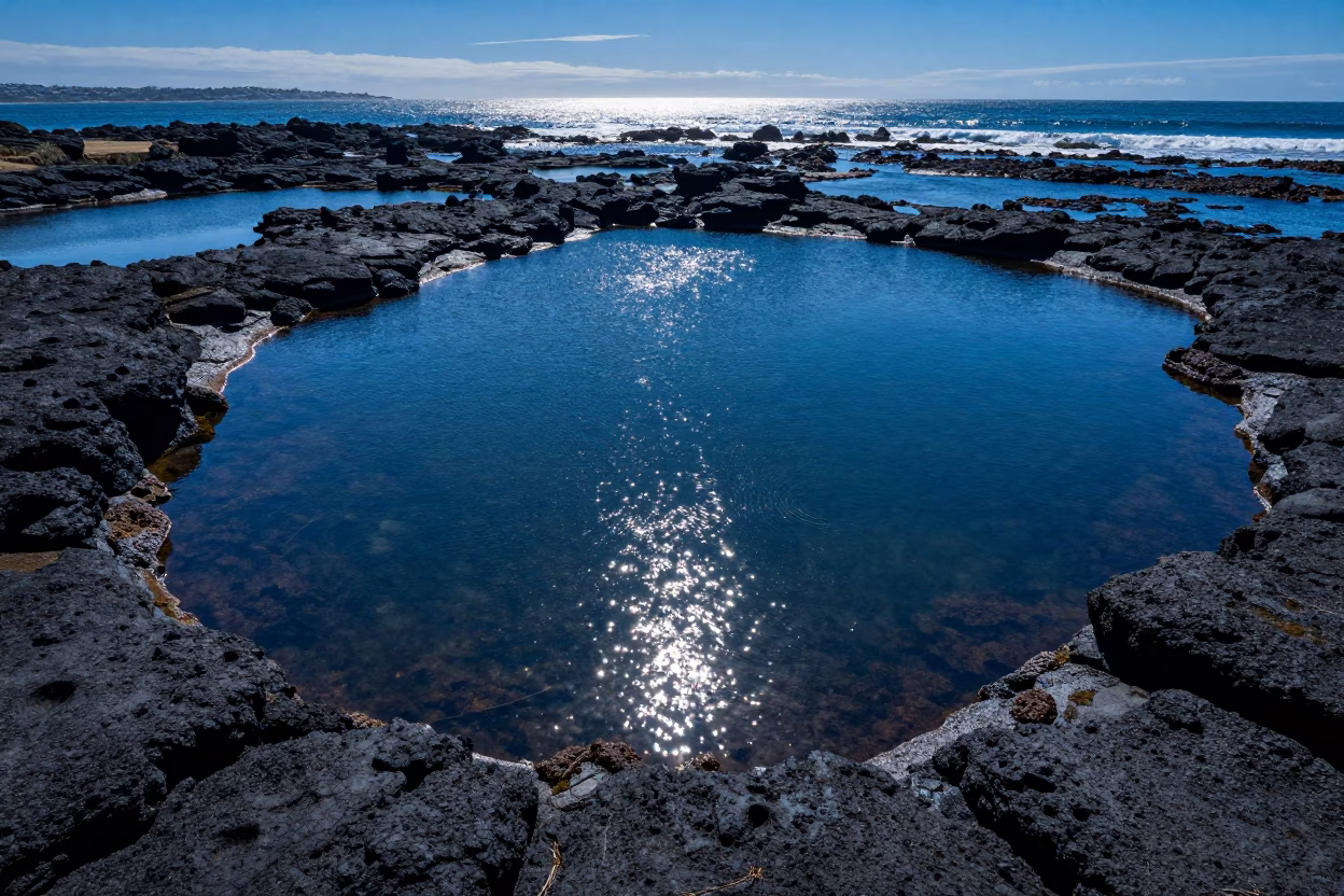 Cape Town Tide Pools Blue Hour Glow in beside a volcanic drop-off near V&A Waterfront, Cape Town