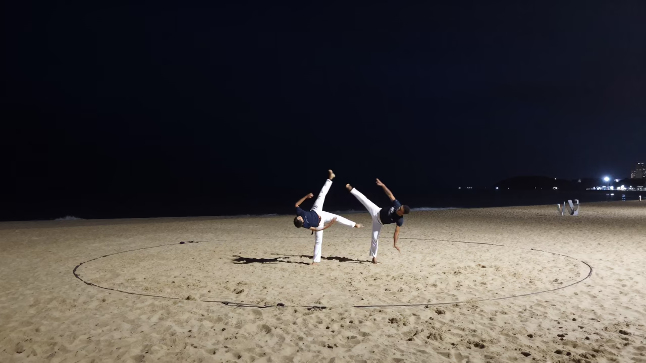 Capoeira Circle on Salvador Beach Under Deep Night Sky in in Salvador, Brazil