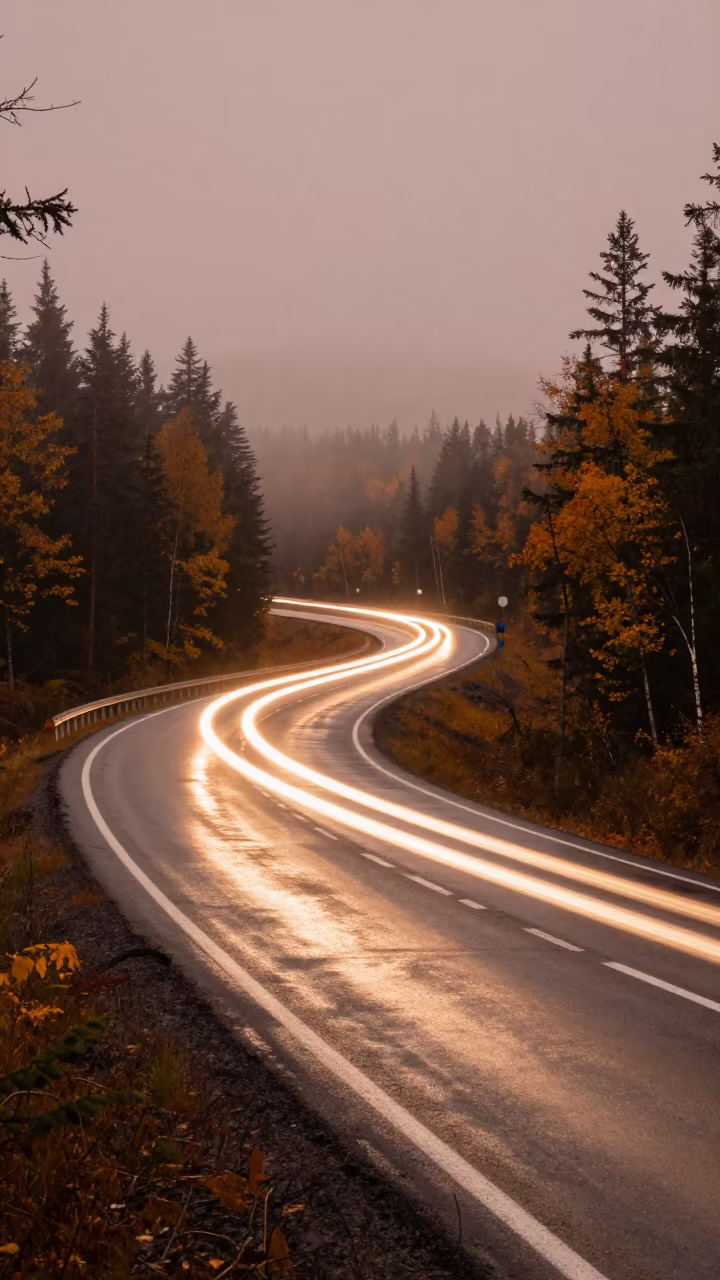 Car Headlight Trails on Siberian Switchback in along a switchback approach in Siberia