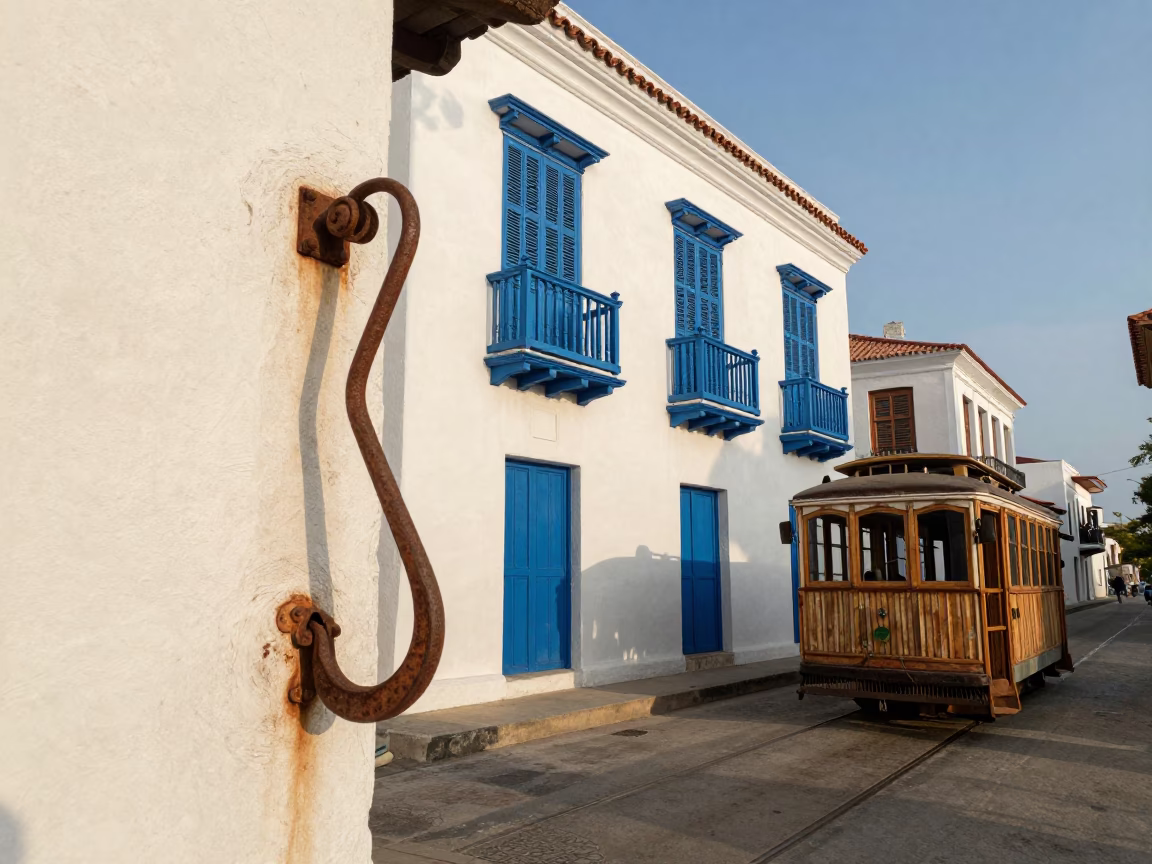 Cartagena Colombia Early Afternoon Street Scene with Vintage Trolley and Iron Hooks in in Cartagena, Colombia