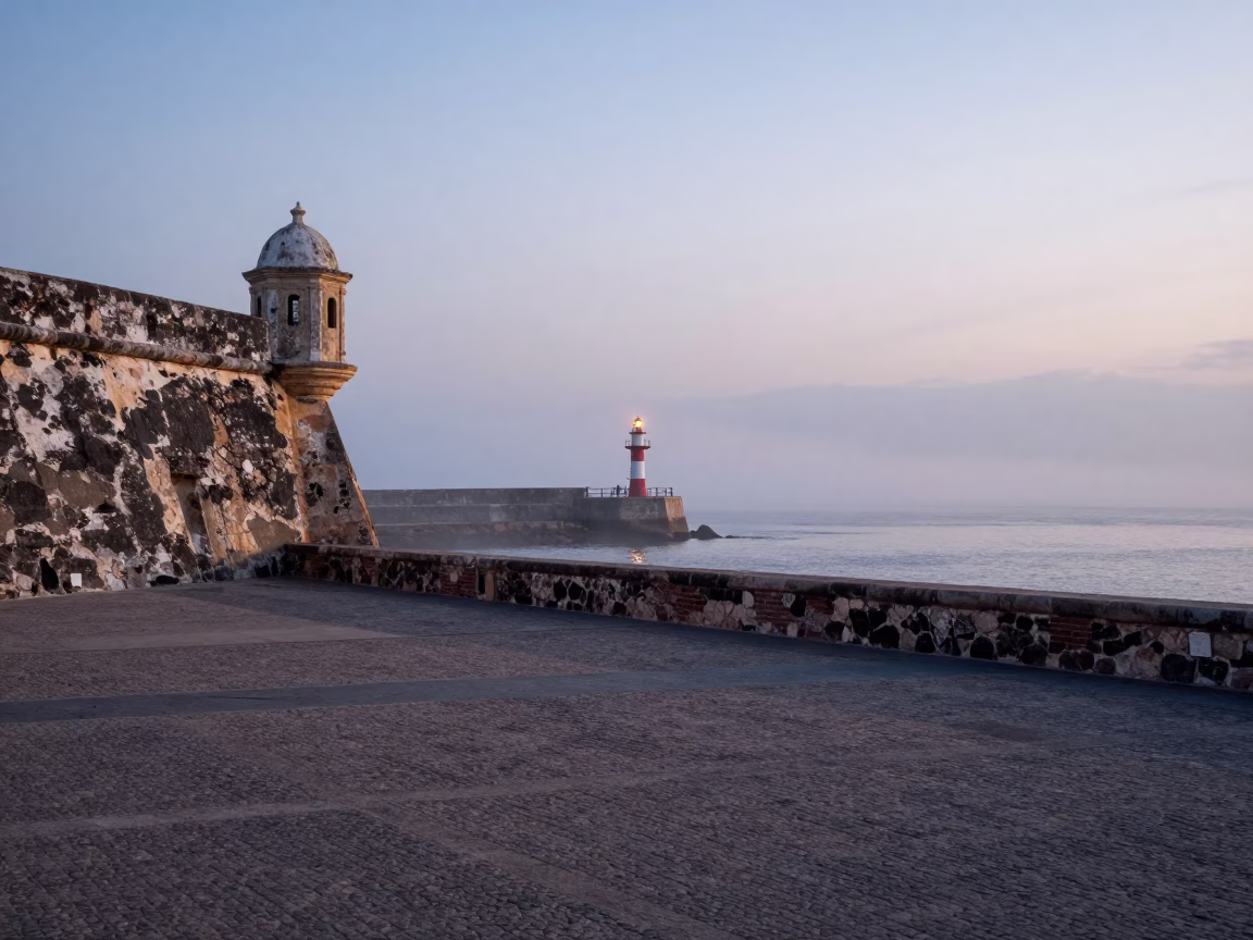 Cartagena Colombia Nautical Dawn Harbor Scene with Breakwater Beacon and Morning Mist in in Cartagena, Colombia