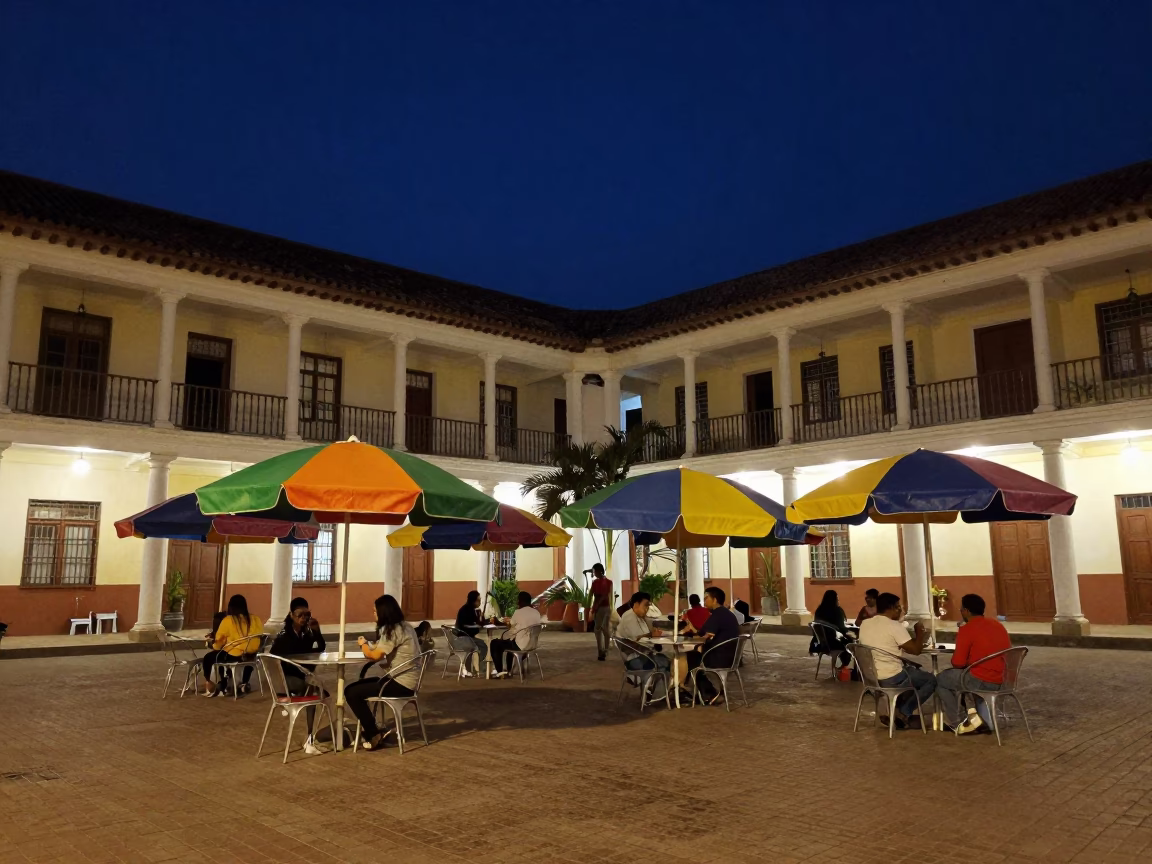 Cartagena Colombia Night Street Scene with University Courtyard Umbrellas and Local Life in in Cartagena, Colombia