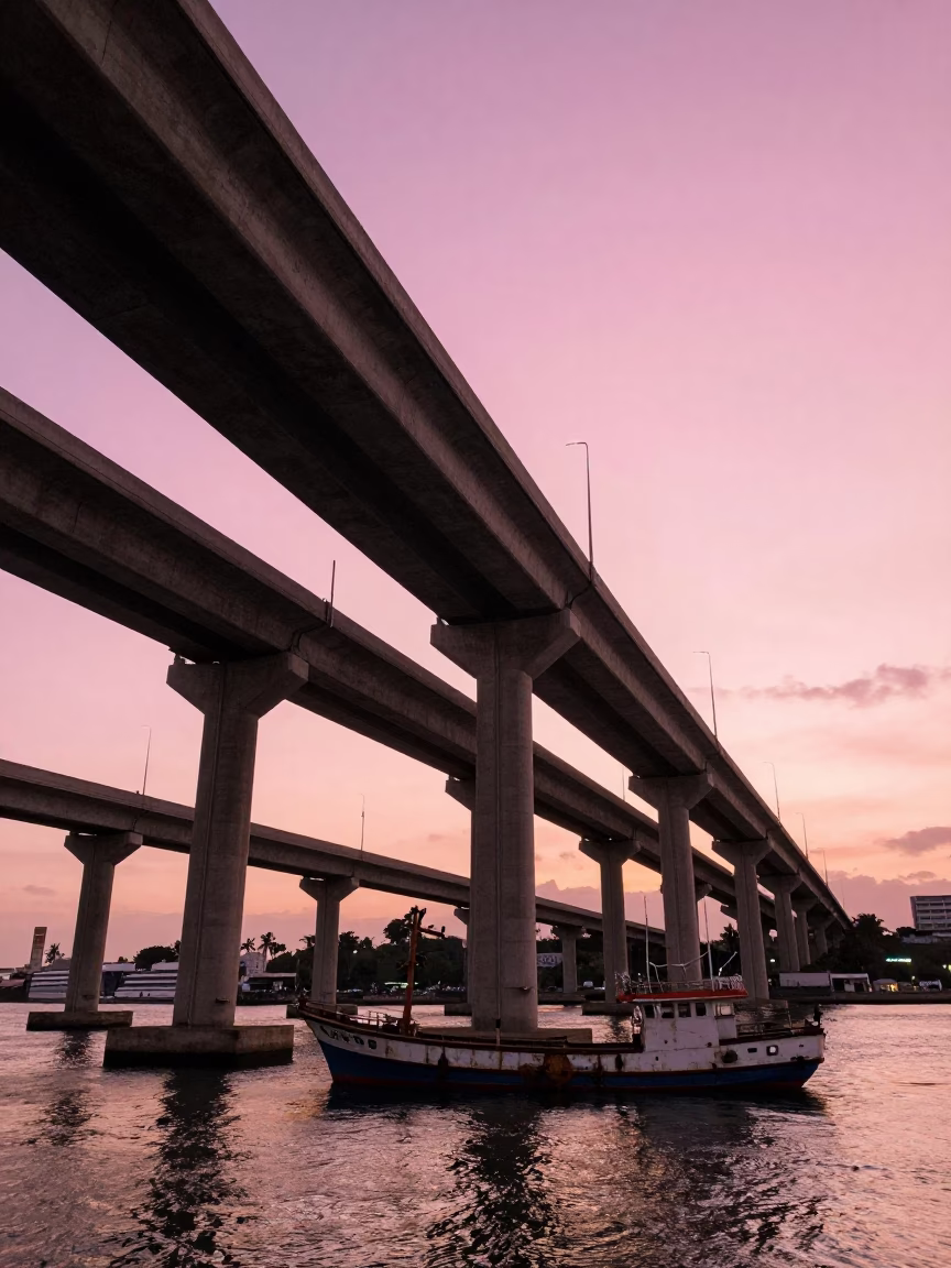 Cartagena Colombia Sunset Highway Overpass Stack Against Pink Sky Junk Boat Harbor in in Cartagena, Colombia