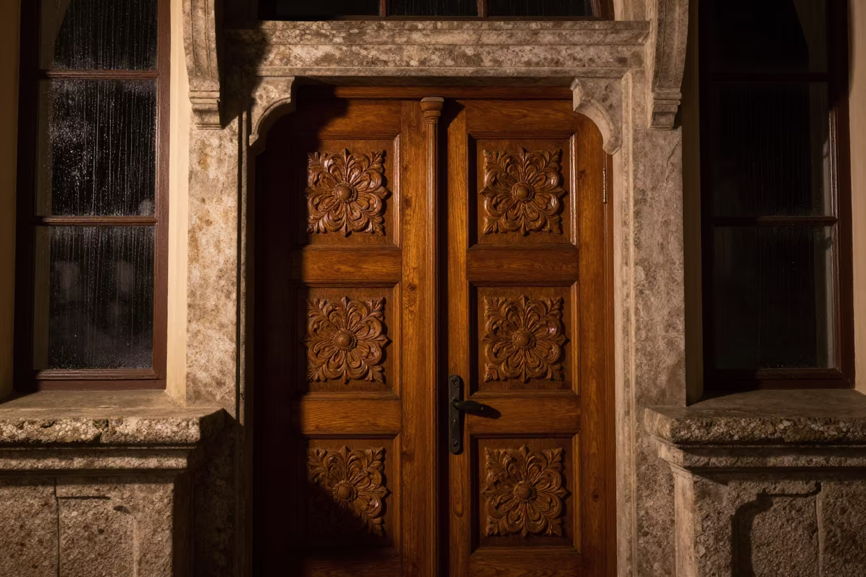 Carved Wooden Church Door Under Night Light in at the foot of a stone altar in Malacca