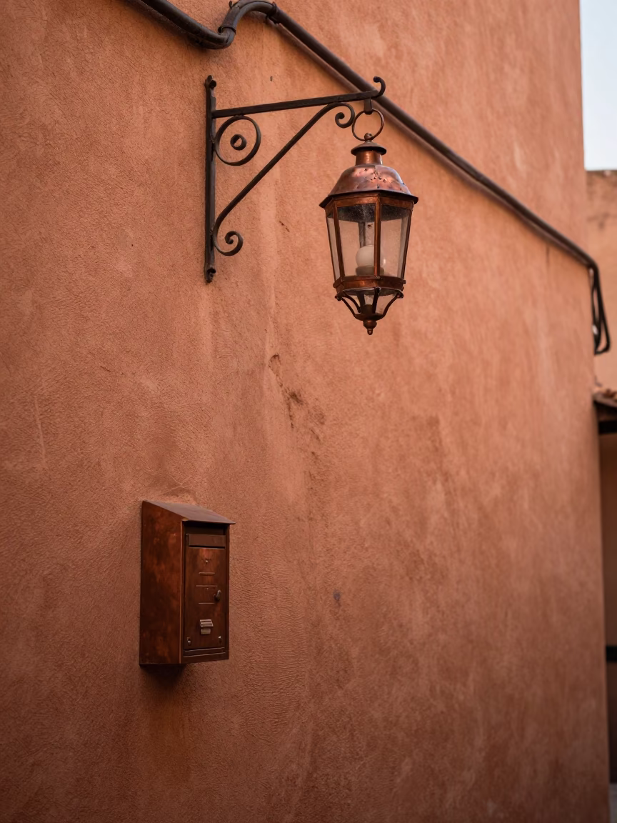 Casablanca Morocco copper dusk lantern alleyway nickel latch mailbox street scene in in Casablanca, Morocco