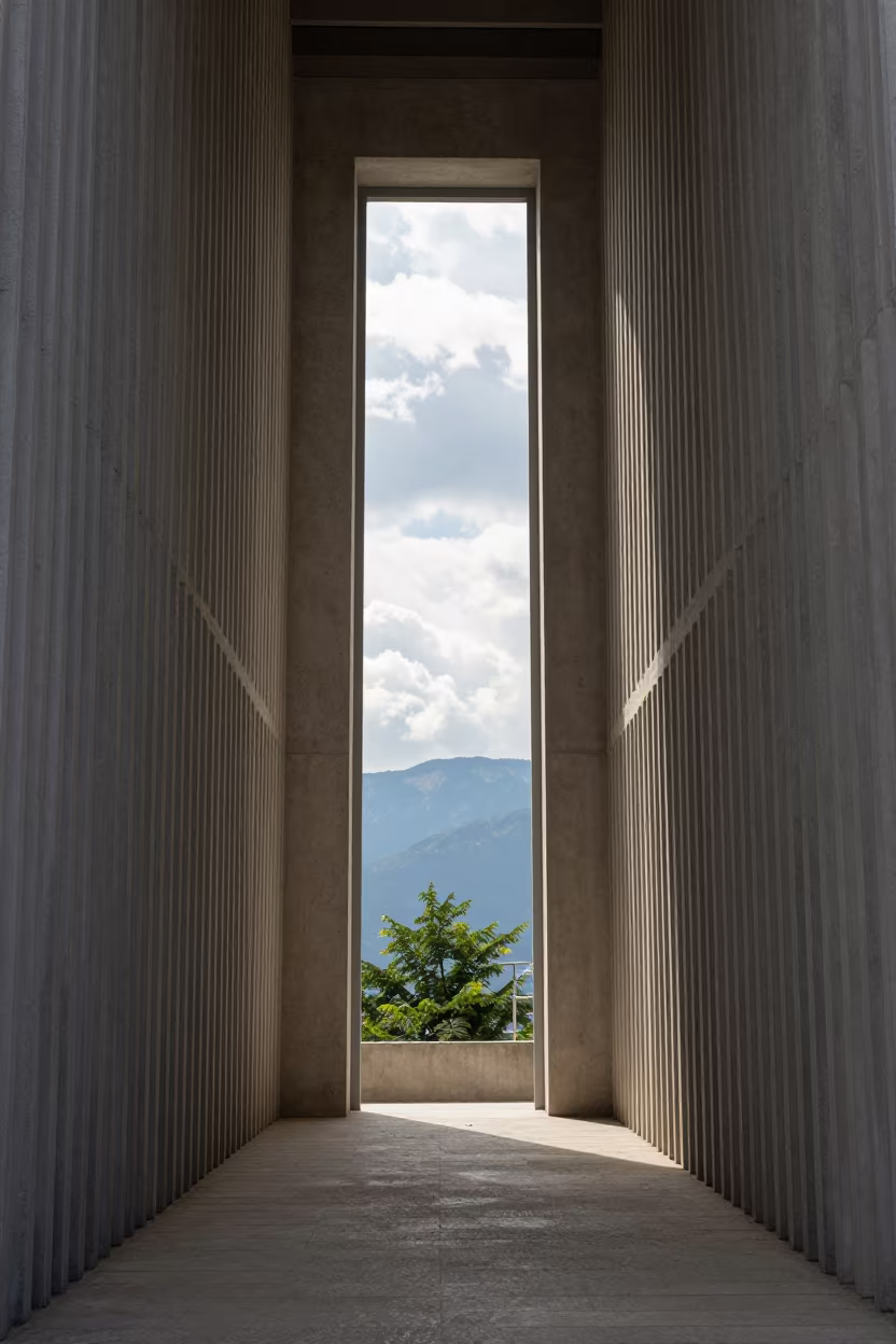 Castle Keep Window Framing Distant Mountains in inside a ribbed concrete lobby in Russeifa