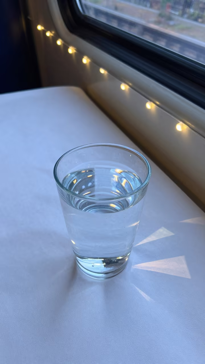 Caustic Light Patterns on White Tablecloth in inside a restored train terminal in Tiaret