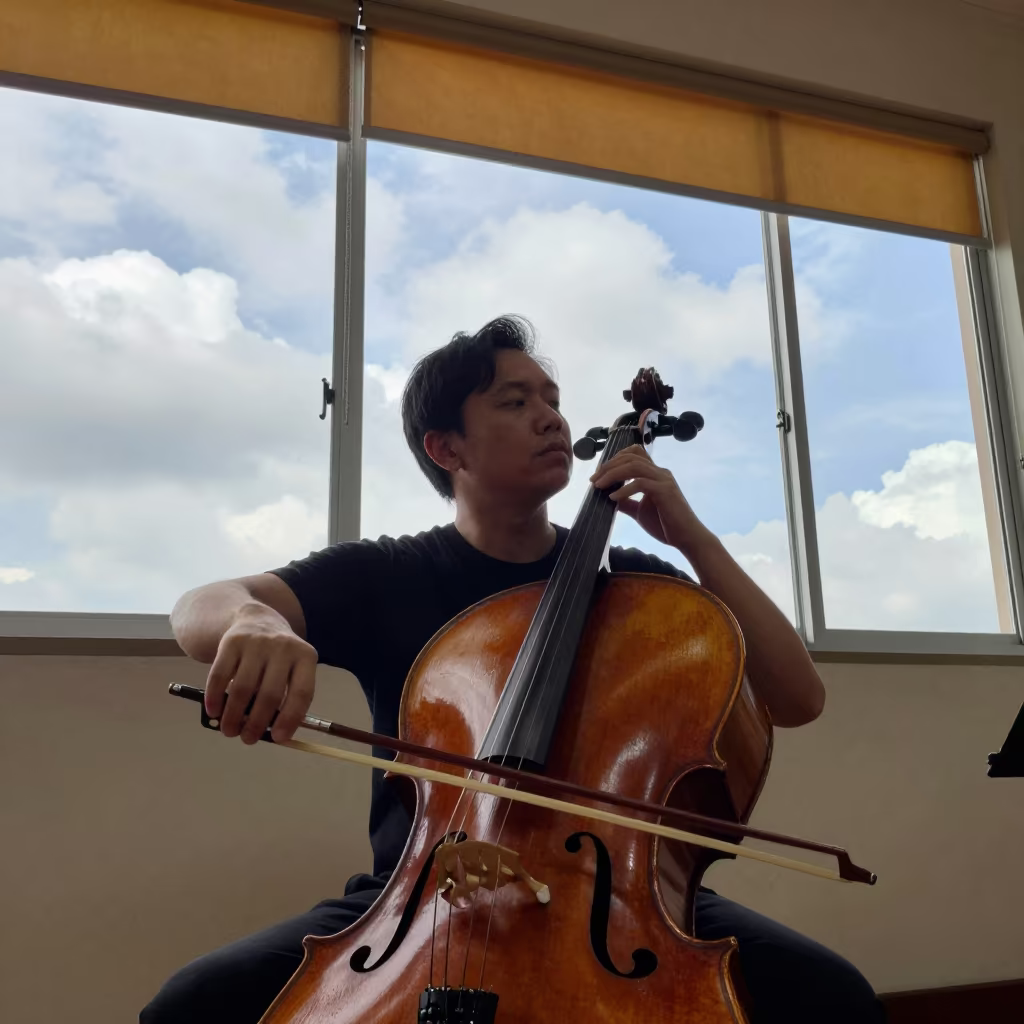 Cellist in Rehearsal Room Light Johor Bahru in in a concert hall in Johor Bahru