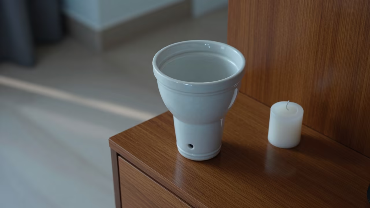 Ceramic Filter Candlelight Dawn Hotel Room in on a hotel dresser in Belo Horizonte