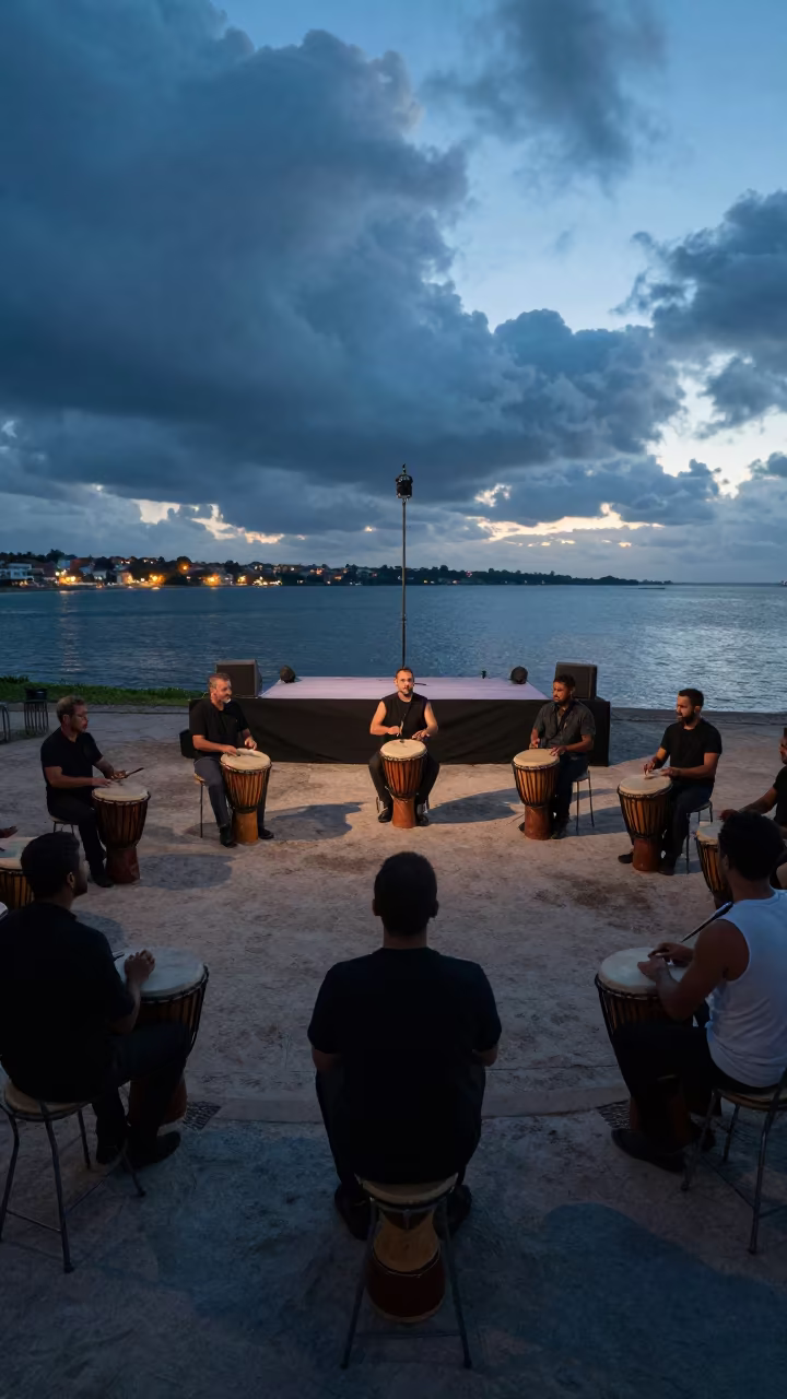 Ceremonial Drumming Circle at Blue Hour in at a waterfront celebration near Moçâmedes