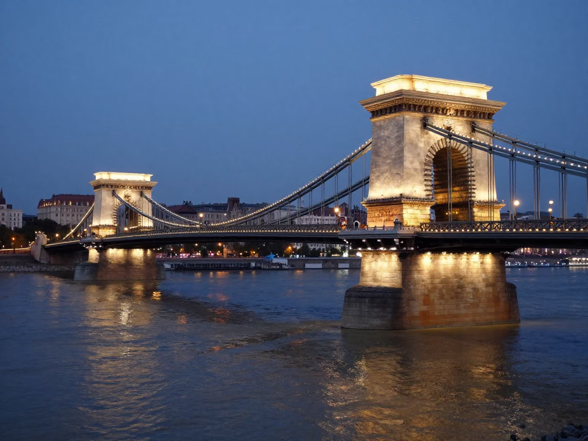 Chain Bridge Pier Cutting Through Brown Danube River Current in Budapest in in Budapest, Hungary