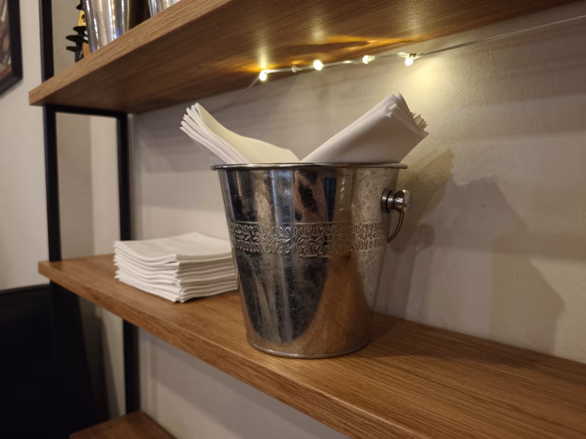Champagne Bucket and Napkins in Diyarbakır Cafe in on a cafe table by a window in Diyarbakır