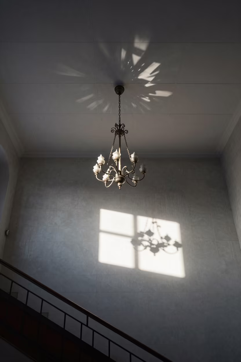 Chandelier Prism Light on Kyiv Stair Hall Ceiling in inside a tiled stair hall in Kyiv