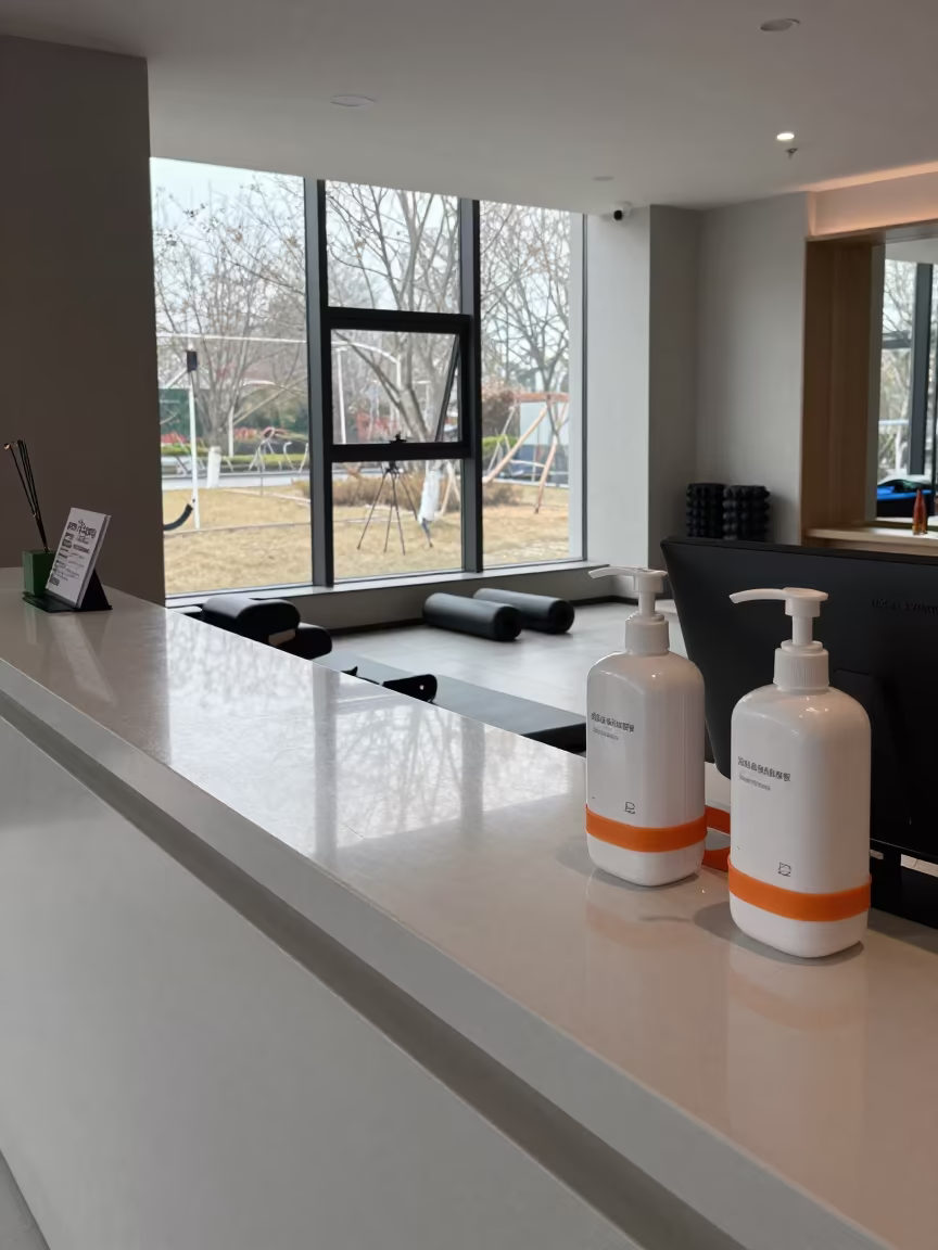 Chengdu Fitness Lounge Check-In Desk in inside a recovery lounge beside foam rollers near Kuanzhai Alley, Chengdu