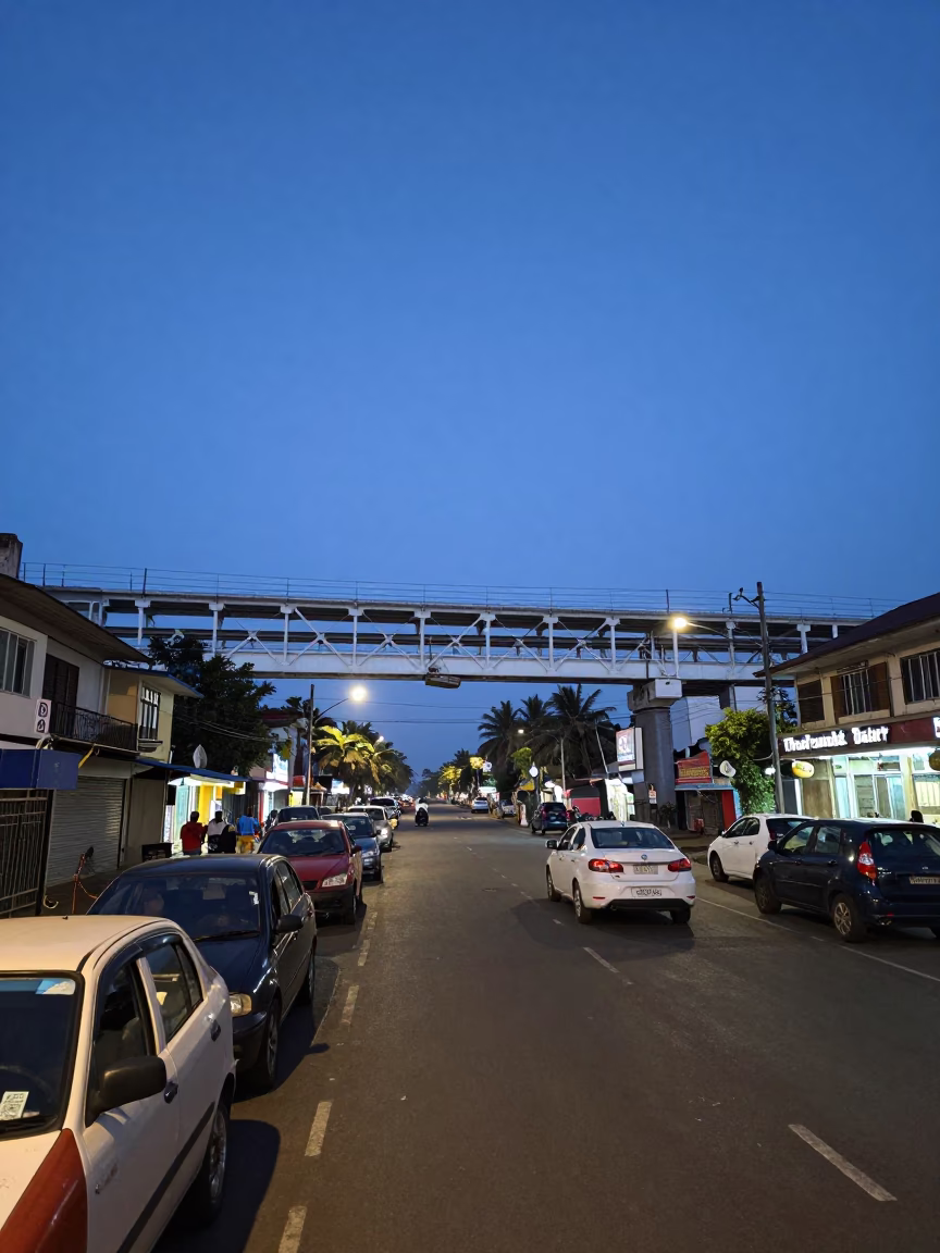 Chennai Blue Hour Street Scene with Railway Viaduct and Local Street Food Vendor in in Chennai, India