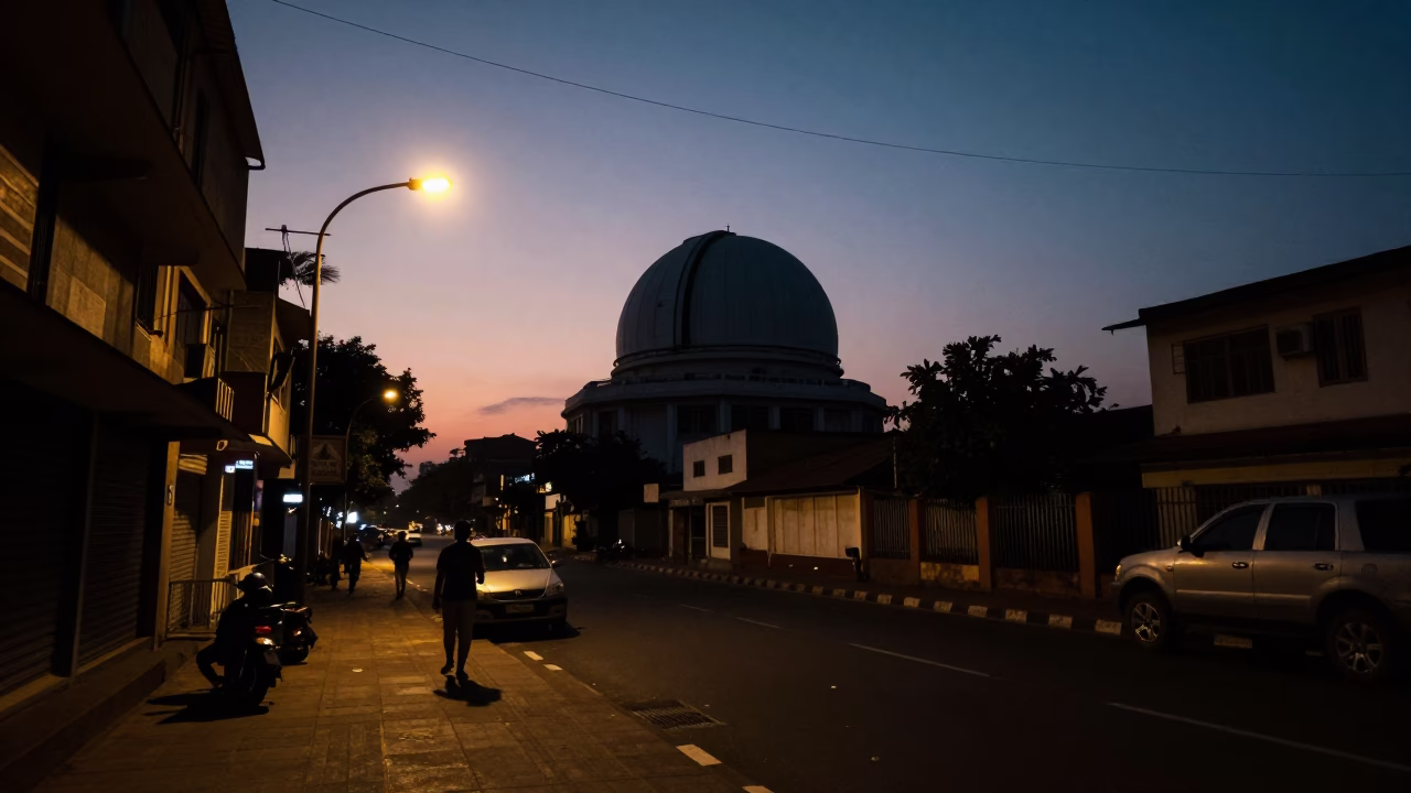 Chennai India Predawn Street Scene with Silhouetted Observatory Dome and Local Morning Activity in in Chennai, India