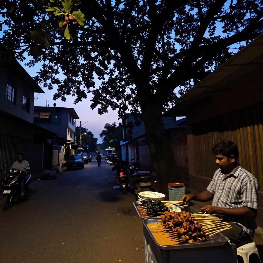 Chennai India street scene at predawn with fig tree and street vendor in in Chennai, India