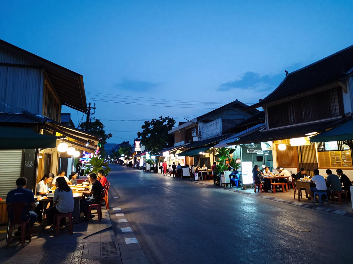 Chiang Mai Blue Hour Street Scene with Local Dining and Urban Life in in Chiang Mai, Thailand