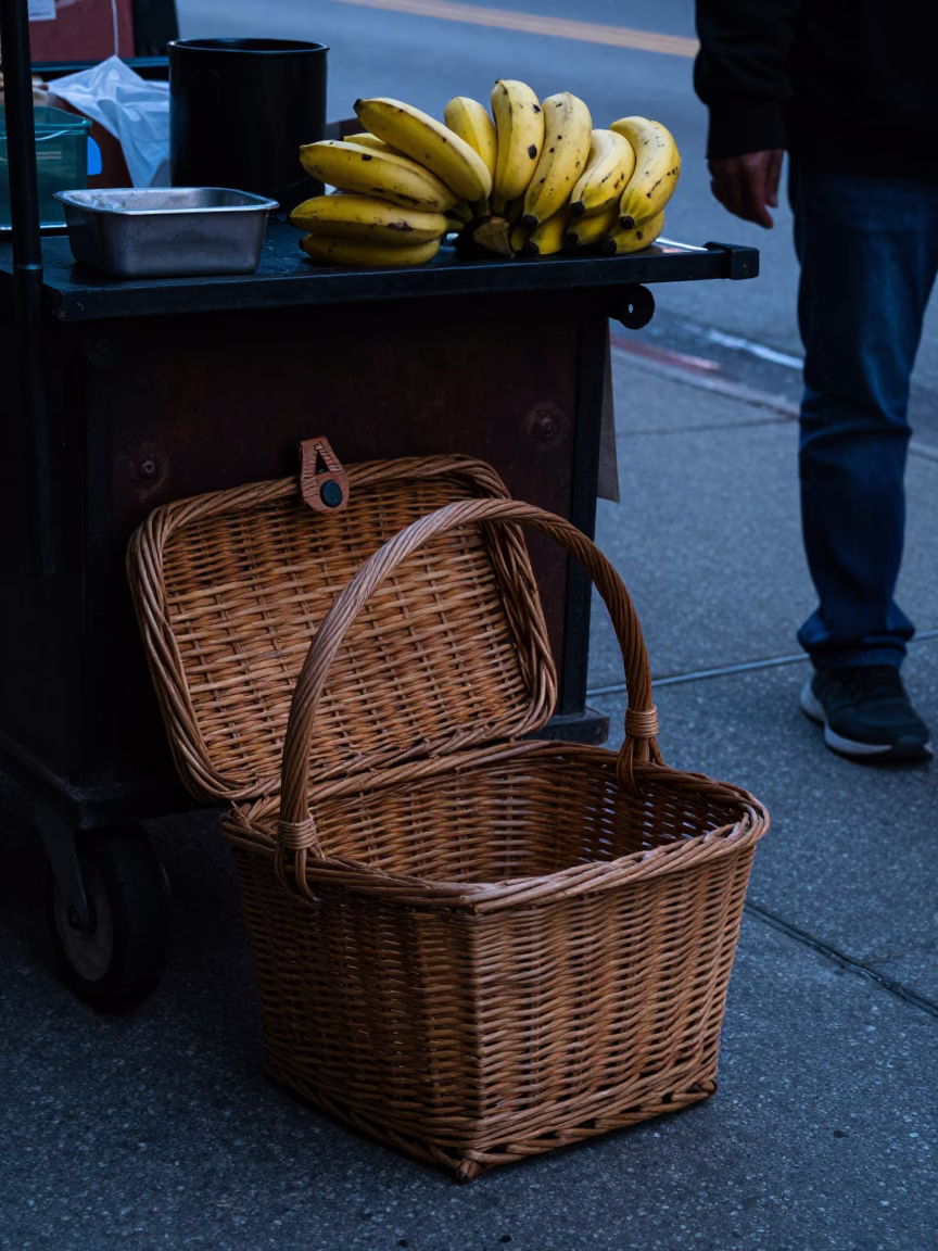 Chicago Blue Hour Street Scene with Wicker Hamper and Bananas on Sidewalk in in Chicago, Illinois, United States