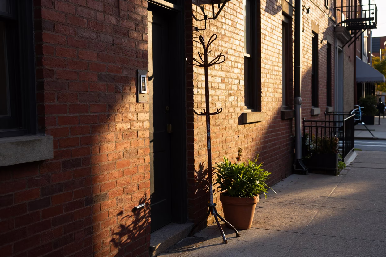 Chicago Dawn Light on Brick Alleyway with Potted Herbs and Coat Stand in in Chicago, Illinois, United States