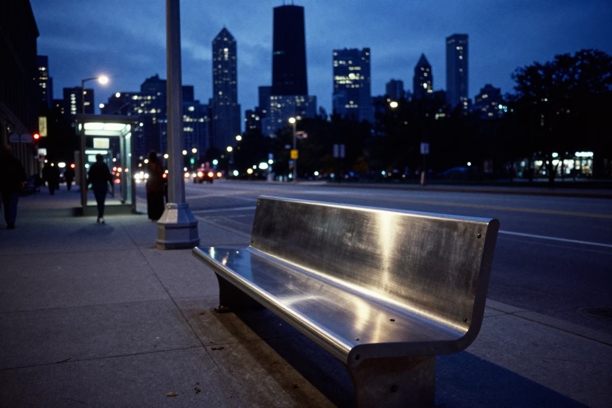 Chicago indigo twilight street scene with brushed steel bench and urban details in in Chicago, Illinois, United States