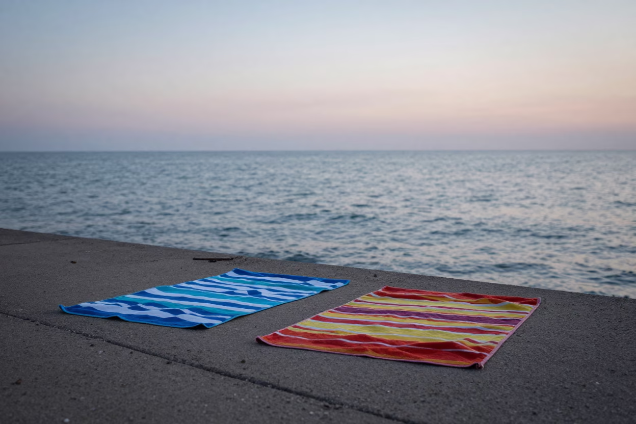 Chicago Lakefront Beach Towels and Early Morning Lake Michigan Shoreline Before Sunrise in in Chicago, Illinois, United States