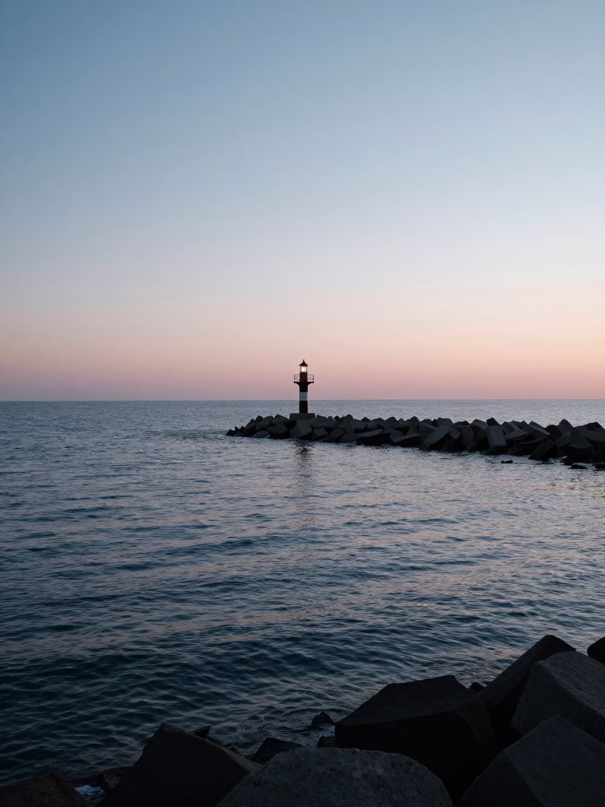 Chicago Lakefront Dawn Breakwater Beacon and Harbor Lights Before Sunrise in in Chicago, Illinois, United States