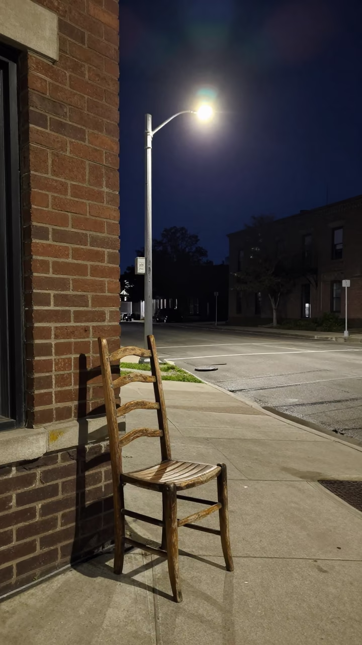 Chicago Street Corner at Night with Ladder-Back Chair and Pegboard Hook in in Chicago, Illinois, United States