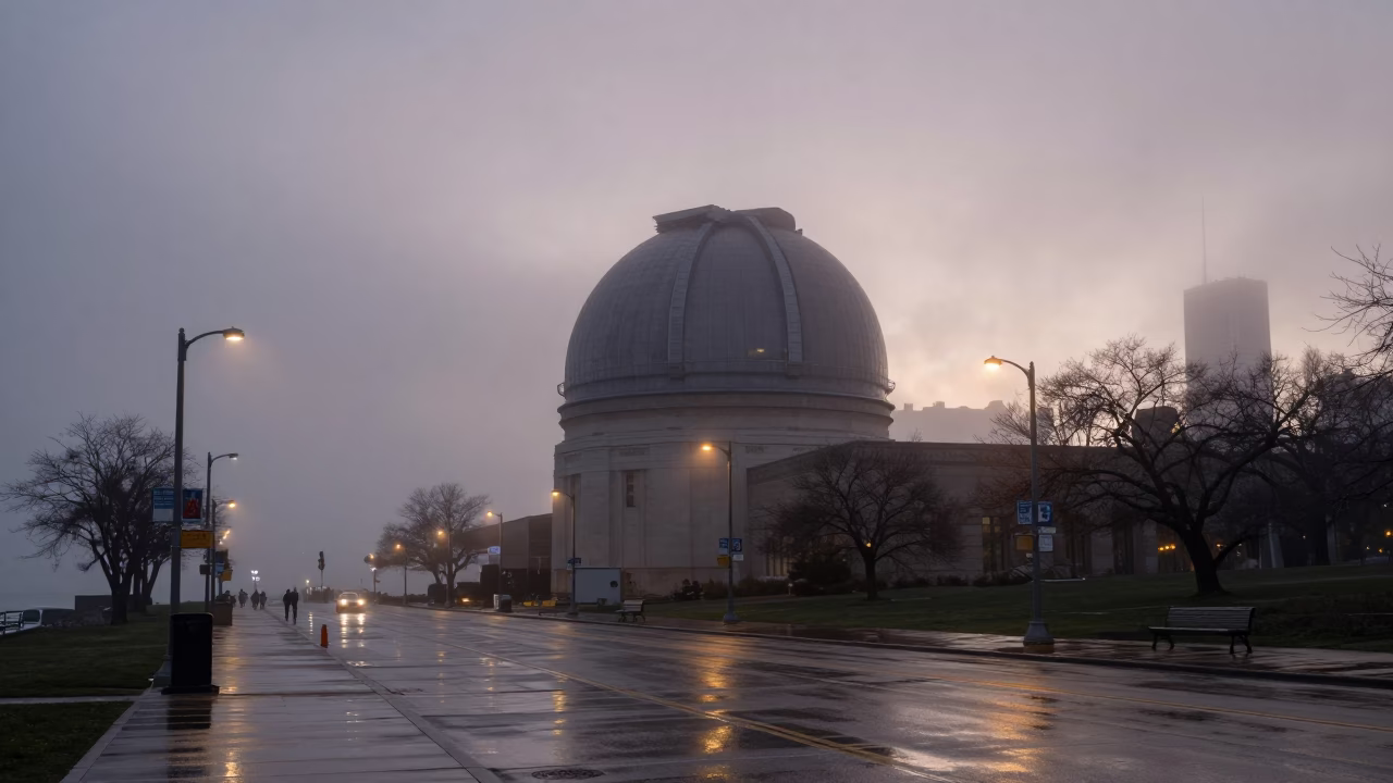 Chicago street scene before dawn with observatory dome fog and urban activity in in Chicago, Illinois, United States