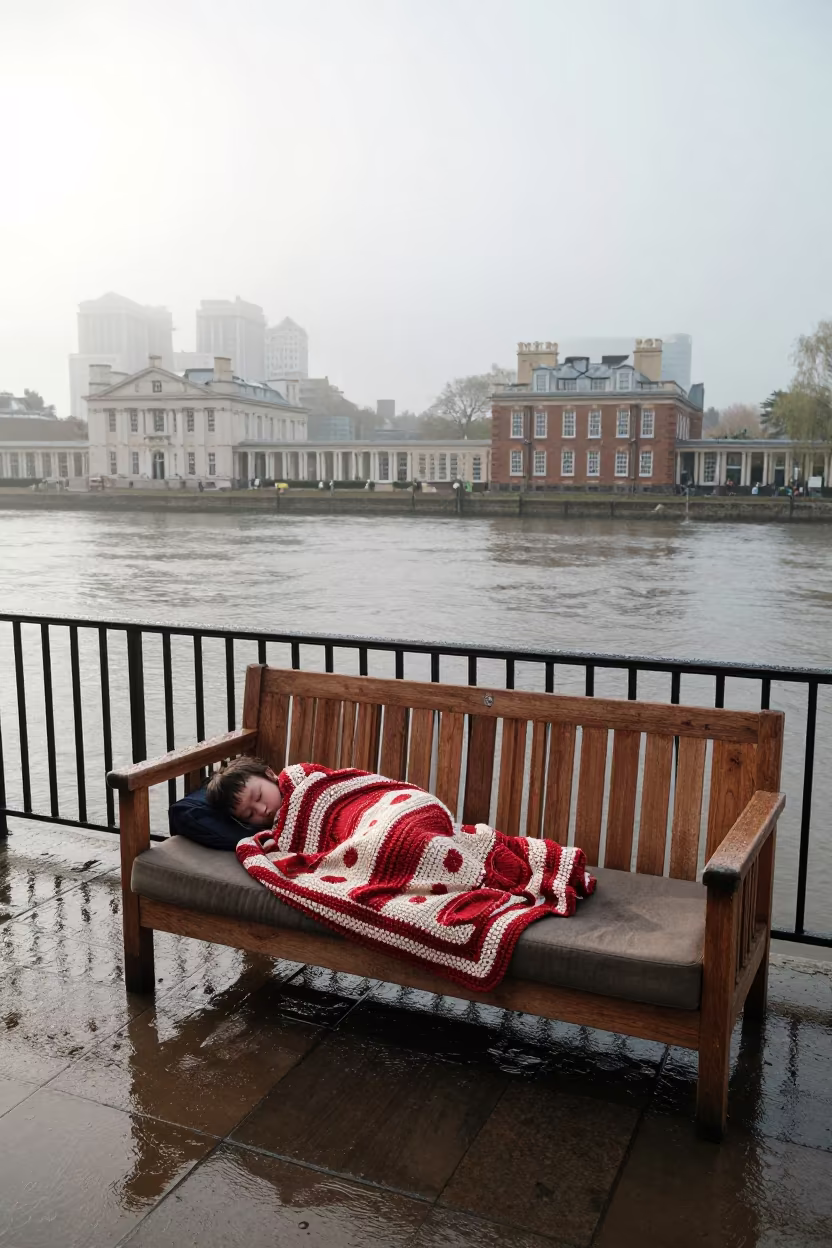 Child Asleep Under Crochet Blanket Greenwich Riverside in near a riverside landing in Greenwich, London