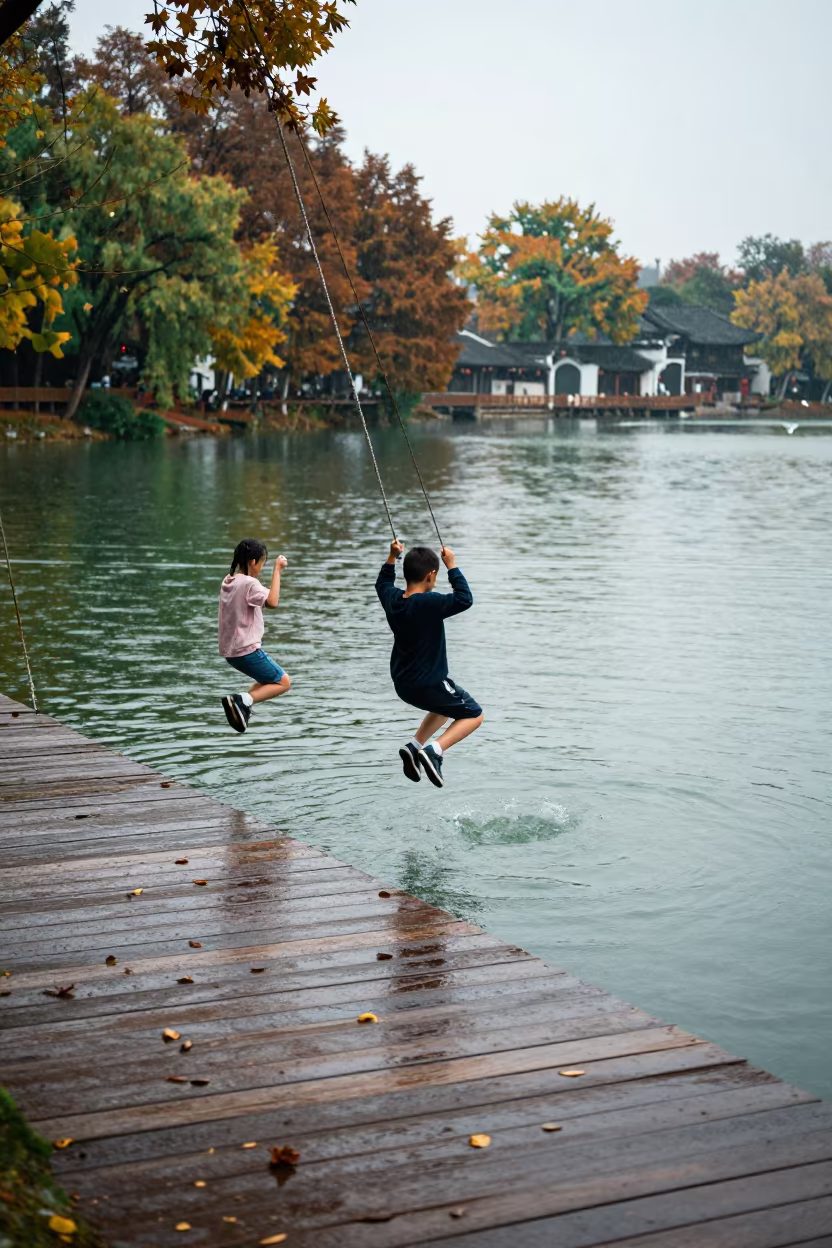 Children Jumping Lake Rope Swing Autumn Noon in in the old quarter in Anyang