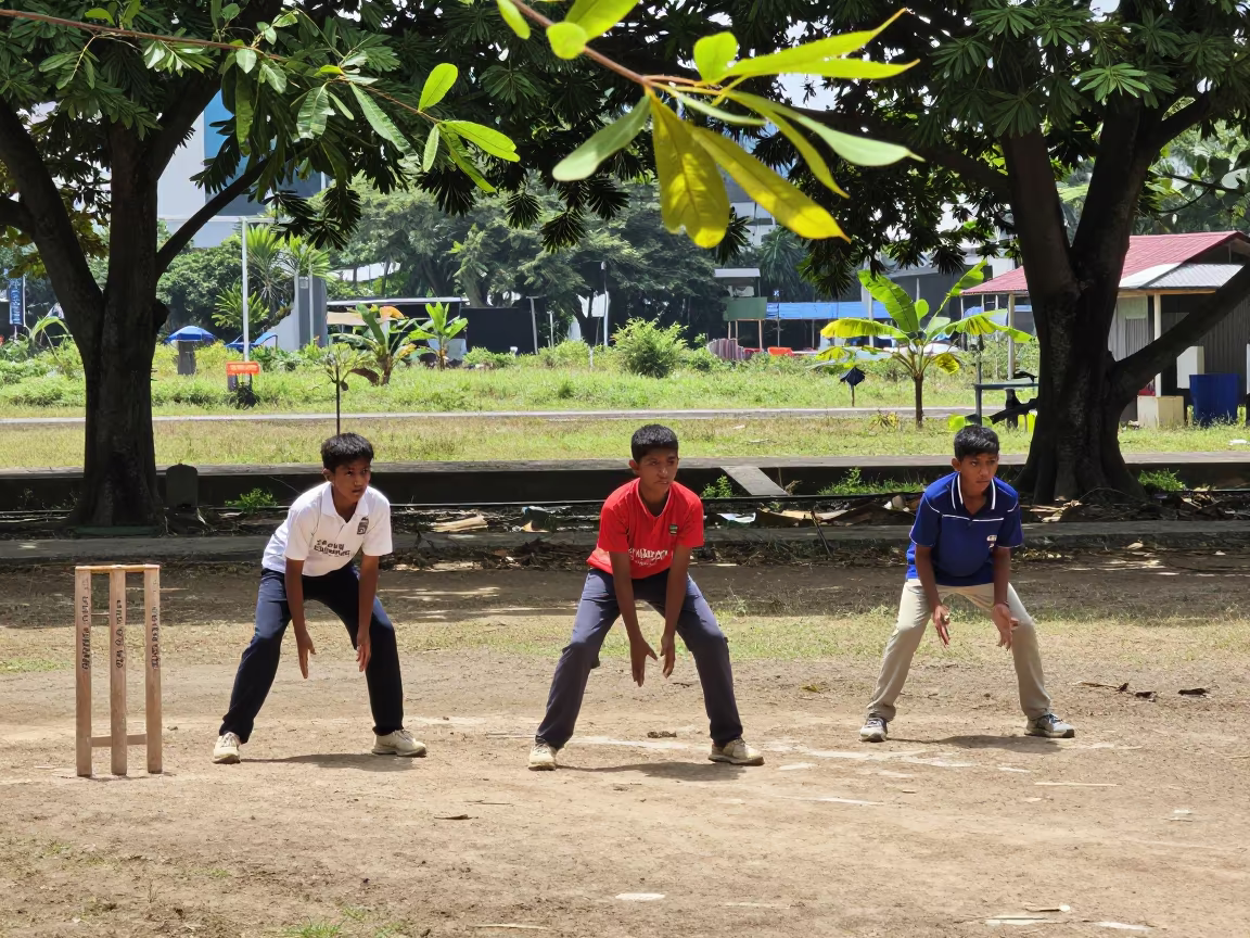 Children Playing Cricket in Dusty Kuala Lumpur Lot in at a roadside stop near Kuala Lumpur