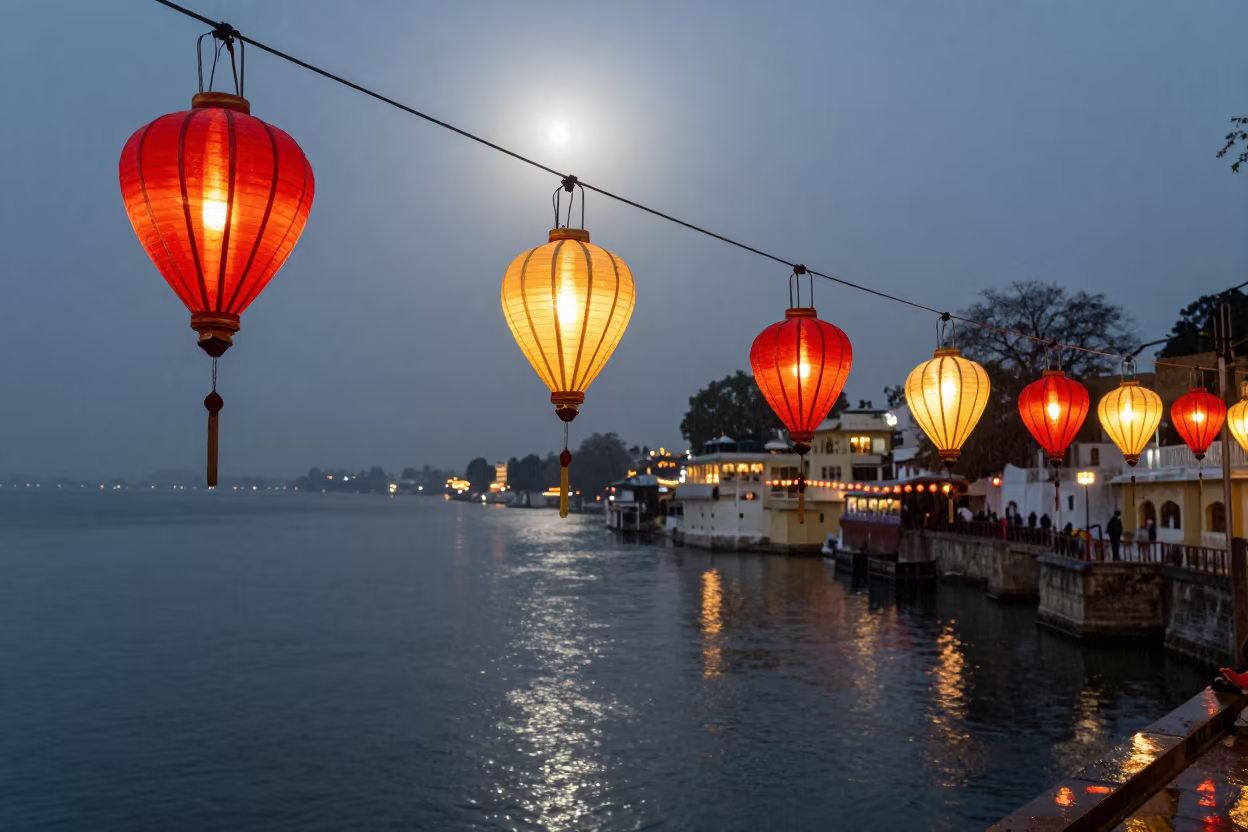 Chinese Lanterns Glow Under Moonlight at Udaipur Waterfront in at a waterfront celebration in Udaipur