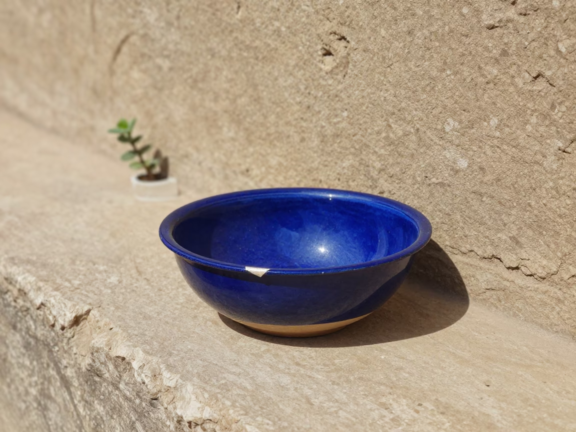 Chipped Blue Enamel Bowl in Cairo in in Cairo, Egypt