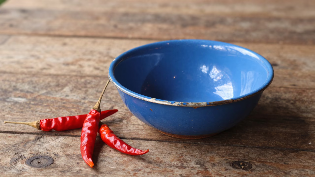 Chipped Blue Enamel Bowl in Chiang Mai in in Chiang Mai, Thailand