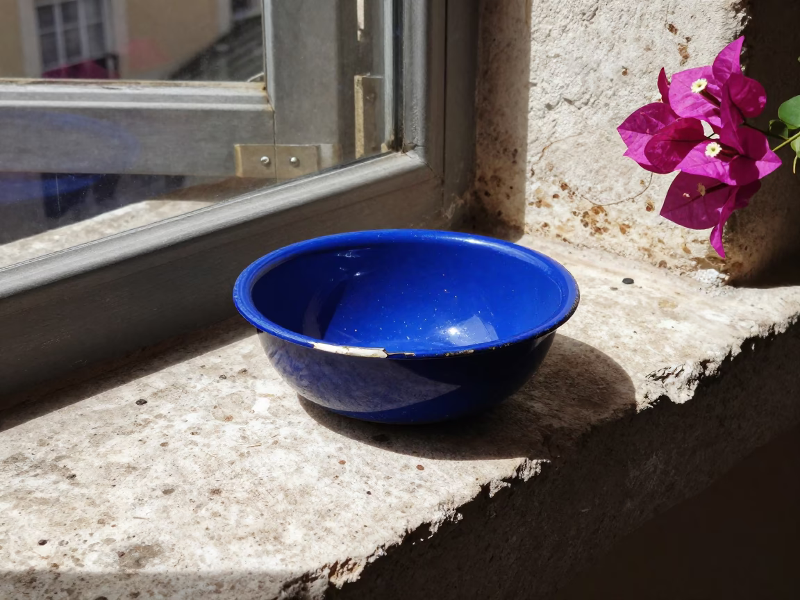 Chipped Blue Enamel Bowl in Lyon in in Lyon, France