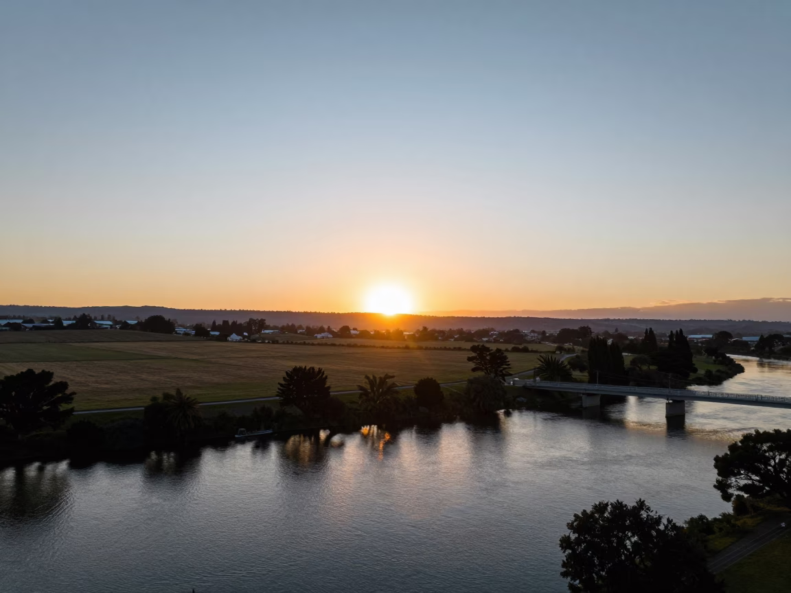 Christchurch New Zealand Horizon Sunset View of River Avon and Bridge in in Christchurch, New Zealand