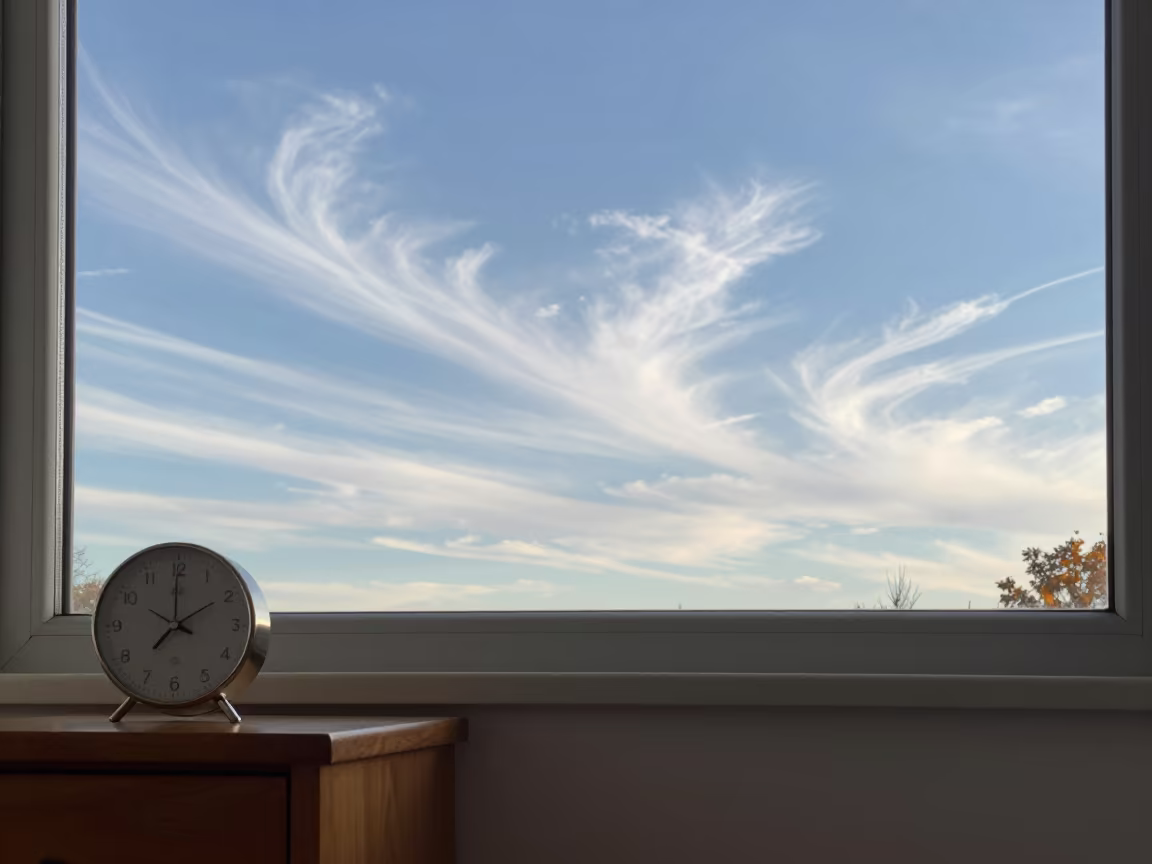 Cirrus Streaks Over Tartu Late Morning Sky in on a bedside table near Tartu