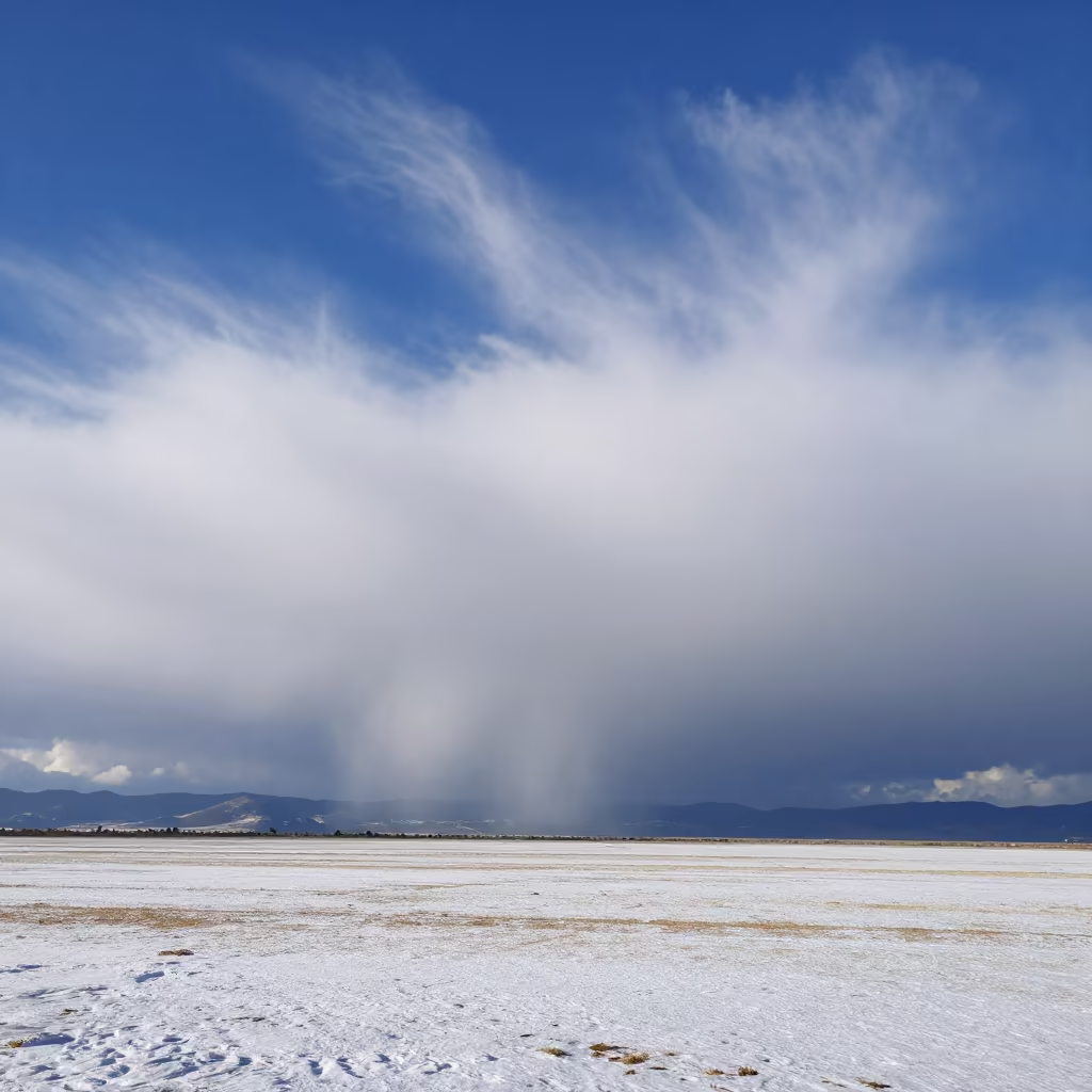 Cirrus Uncinus Clouds Over Storm Bright Winter Plain in across a storm-bright plain near Queretaro