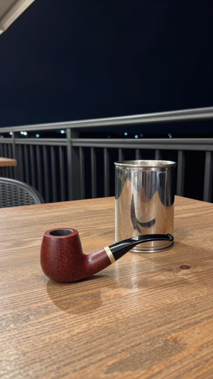 Clay Pipe and Pewter Tankard on Pier Table in on a pier railing near Rouen