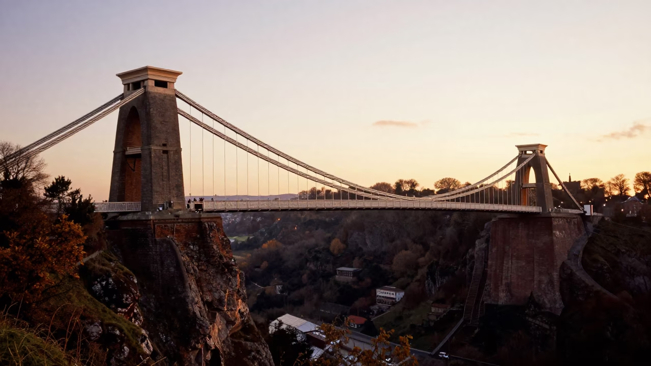 Clifton Suspension Bridge and funicular railway in Bristol honeyed evening light in in Bristol, United Kingdom
