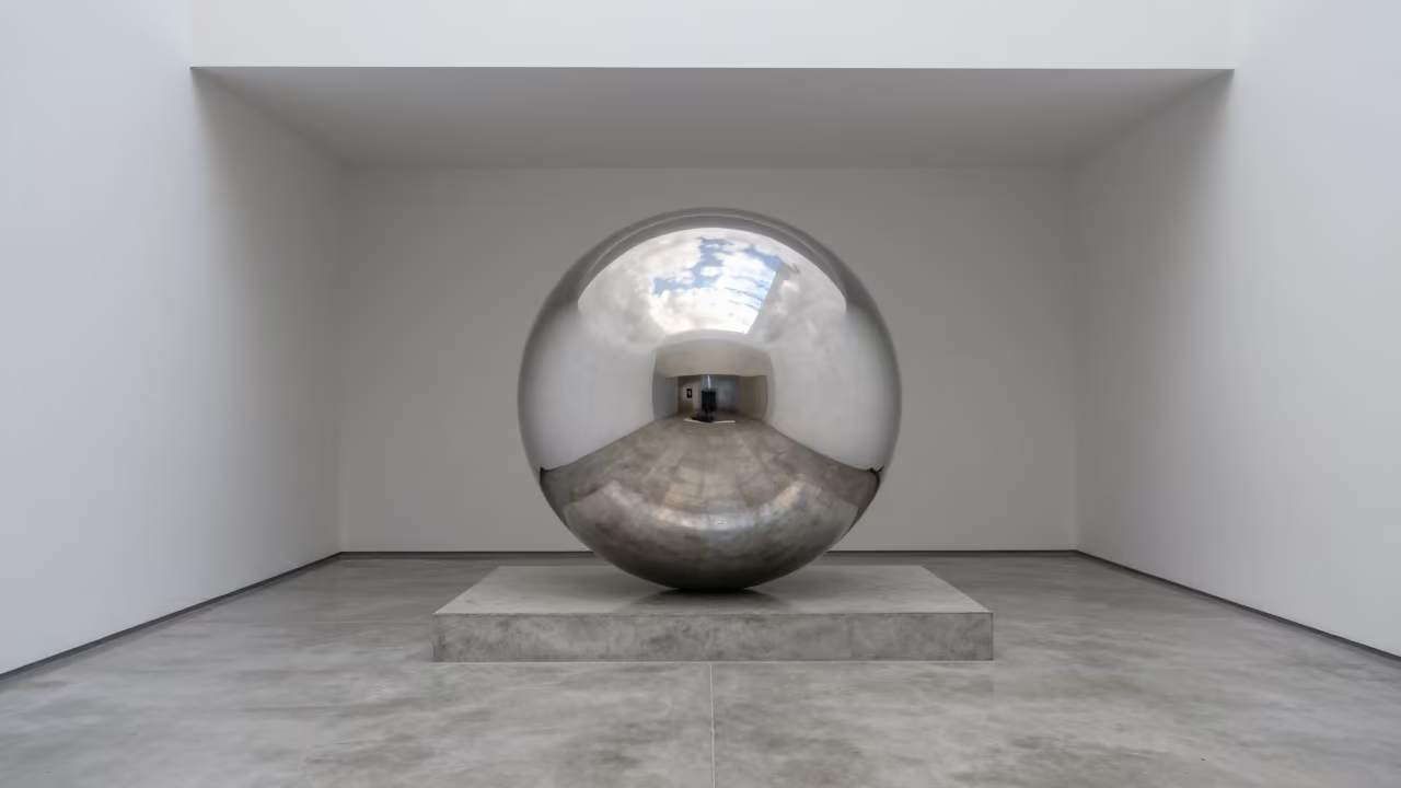 Cloud Reflections in Chrome Sphere in inside a skylit passageway in Guanare