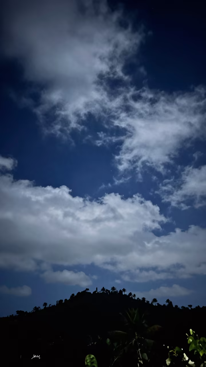 Cloud Streaks Moonlit Honduras Night Sky in under a band of cold starlight in Honduras
