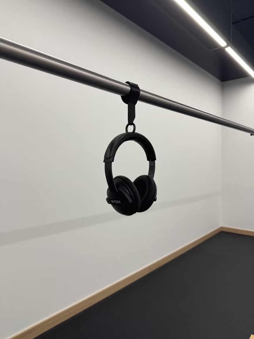 Coach Headset Hook Rail Night in inside a yoga studio before the session begins in Asyut