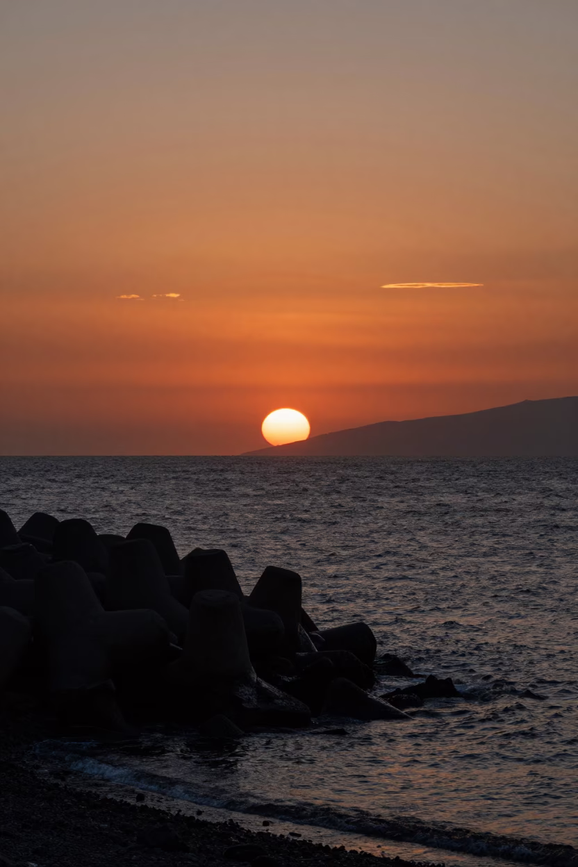 Coastline in Vancouver at As The Sun Drops Toward The Horizon in in Vancouver, British Columbia, Canada