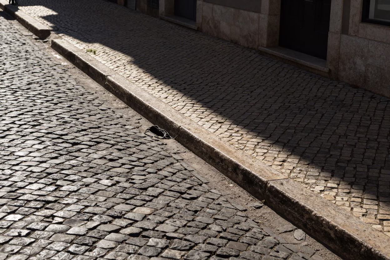 Cobblestone Street in Lisbon at The Late Morning Light in in Lisbon, Portugal