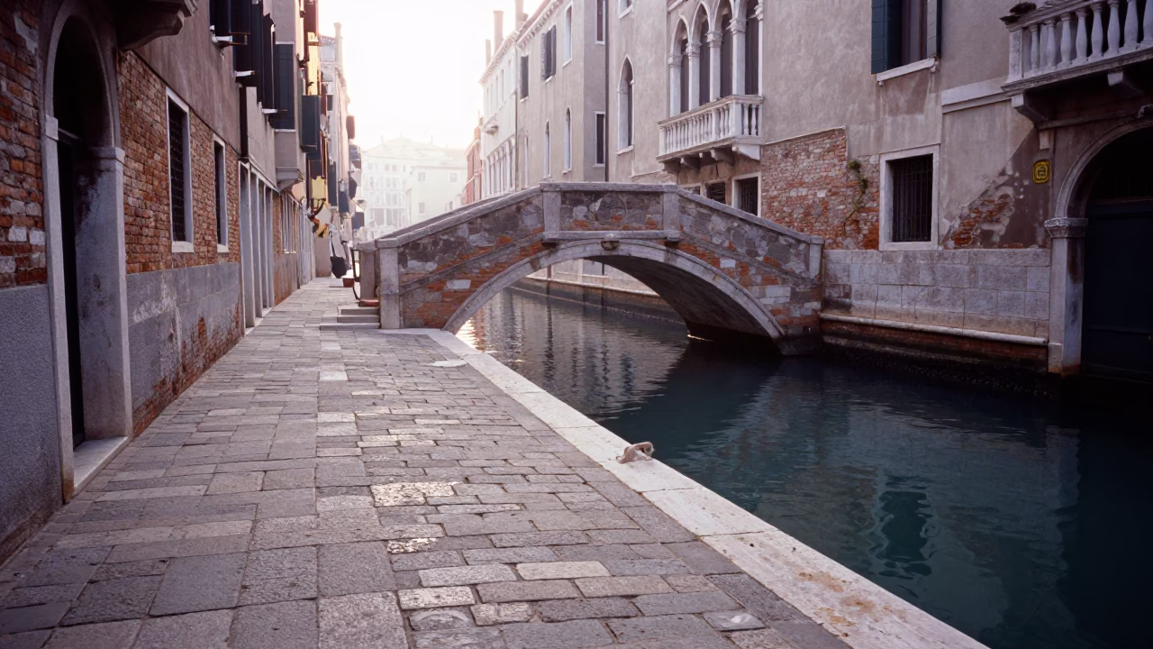 Cobblestone Street just after sunrise in Venice in in Venice, Italy