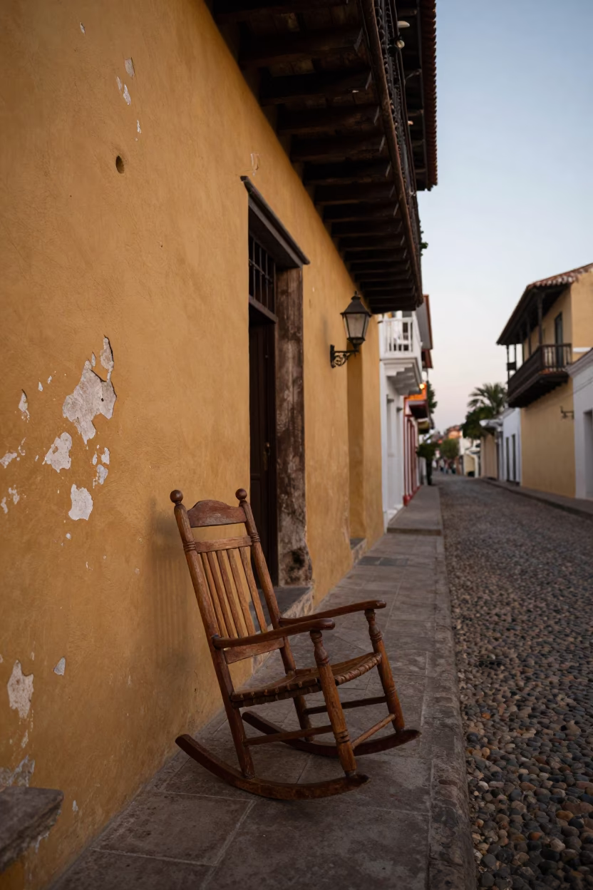 Colonial Balcony Evening Scene in Cartagena Colombia with Wooden Rocking Chair in in Cartagena, Colombia