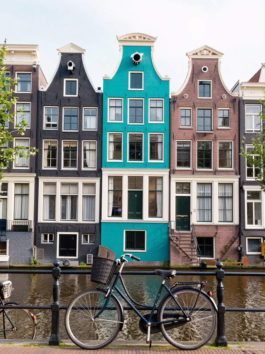 Colorful Canal House Facade with Bicycle in Bright Midmorning Amsterdam Netherlands in in Amsterdam, Netherlands